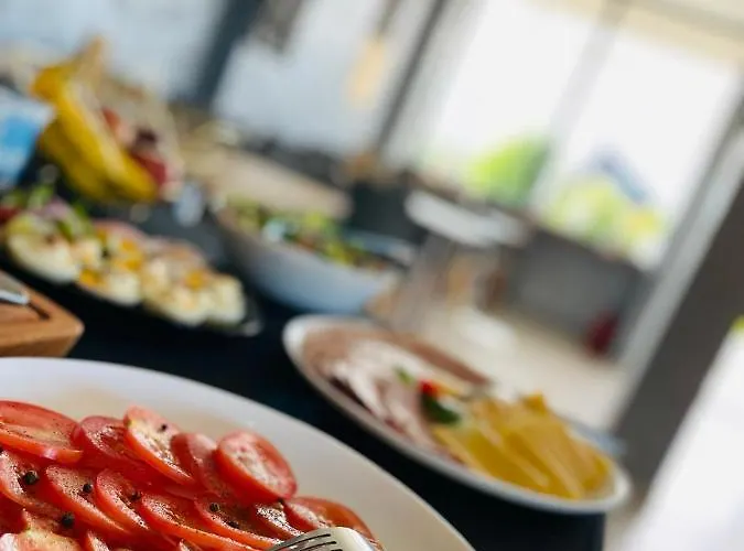 Emi By Housine Zator