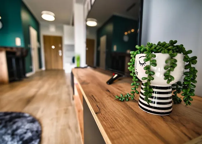 Emi By Housine Zator